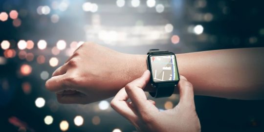 abstract-Hand-setting-route-for-GPS-on-the-smart-watch