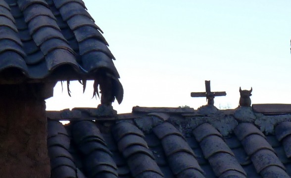 Christian cross at a temple